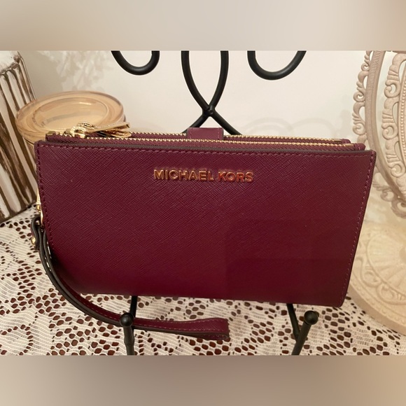 Michael Kors Plum Wristlet